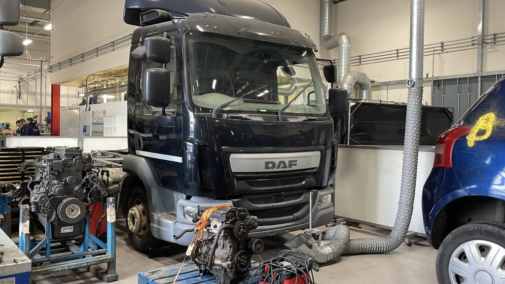 Automotive manufacturing lorry in workshop.